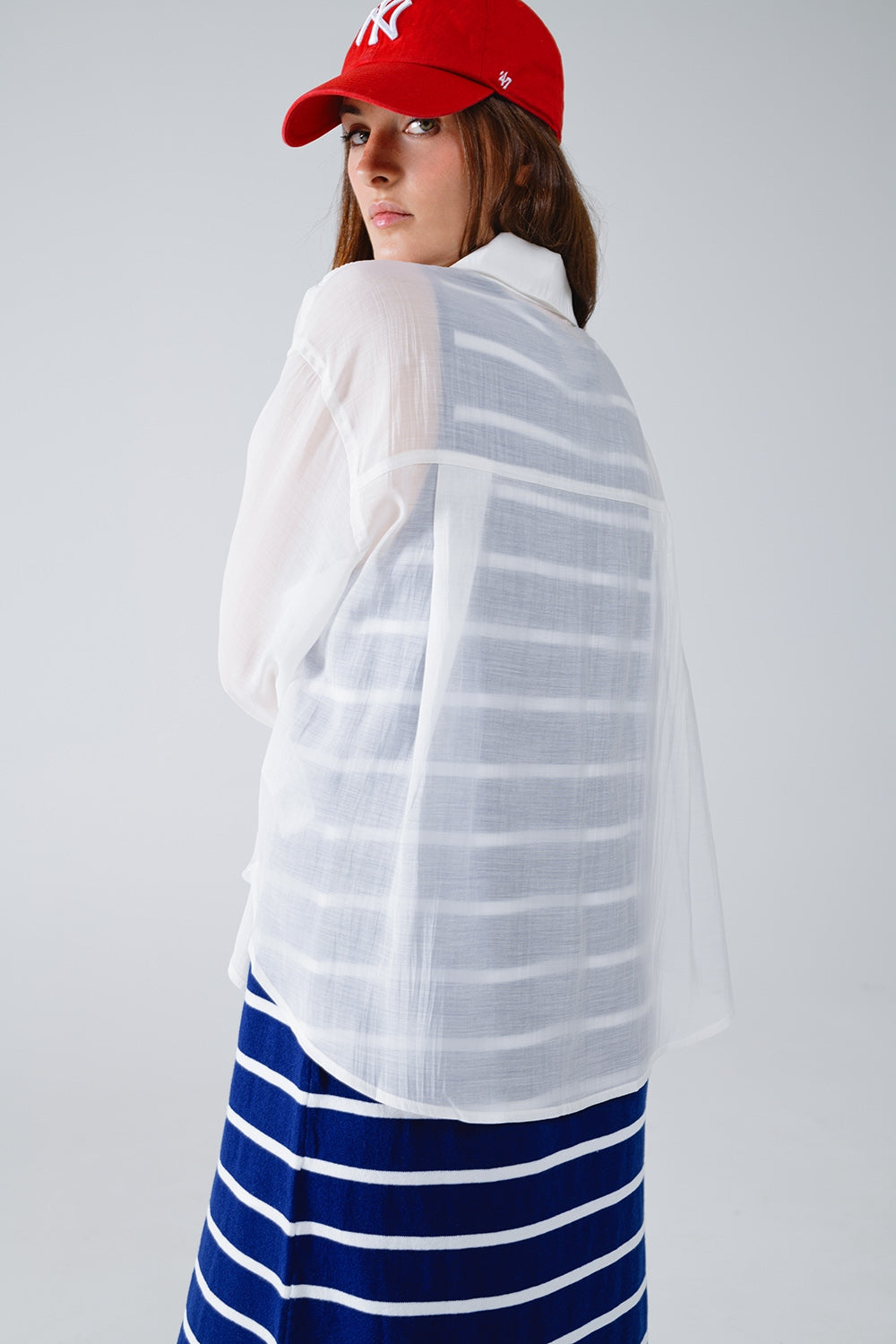 White Semi Sheer Blouse With Ruffle Detail Down The Front